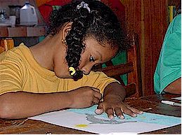 A girl from the Galapaogos draws for the project.
